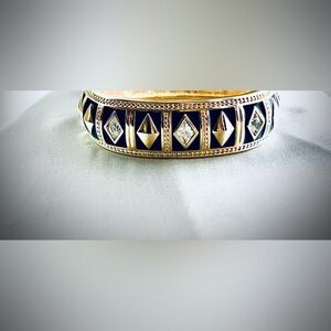Swarovski Vintage 80’s Bracelet Gold tone, clear crystals and gold,black enamel.